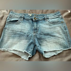 Women’s Kut from the kloth frayed light wash jean shorts.